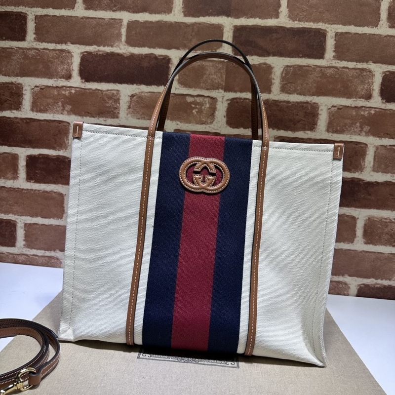 G*u*i shopping bags